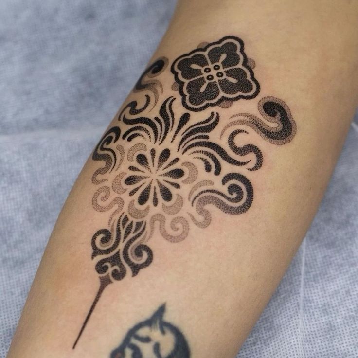 Intricate Dotwork Floral Tattoo