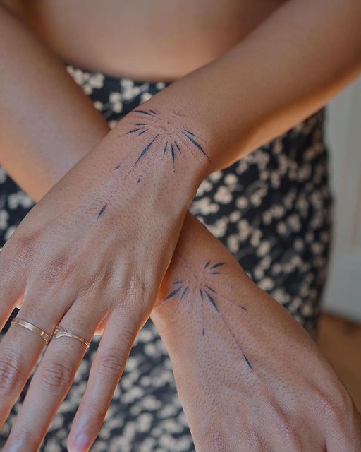 Elegant Dotwork Hand Tattoo