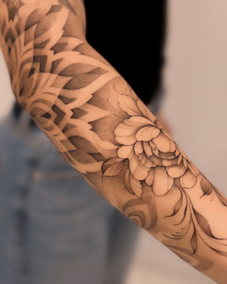 Elegant Floral Dotwork Tattoo