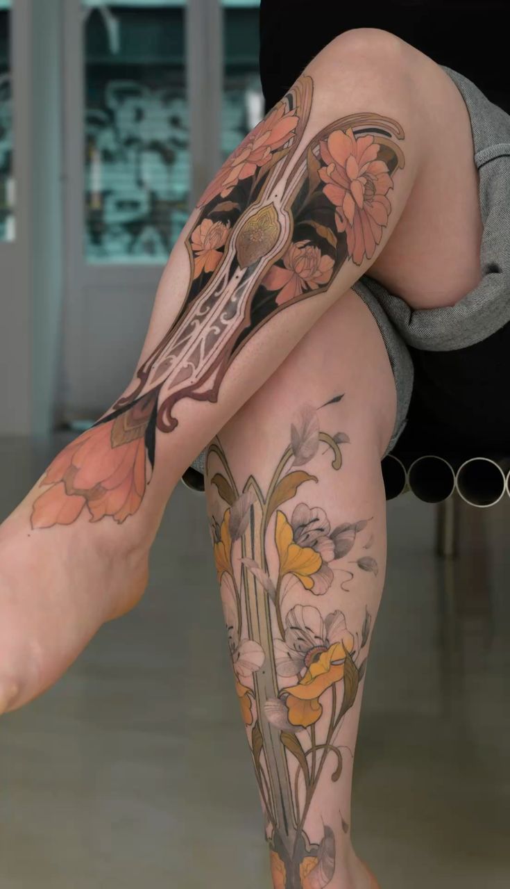 Vibrant Floral Leg Tattoo