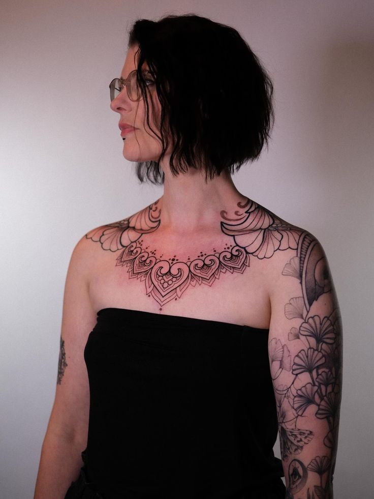 Elegant Dotwork Chest Piece Tattoo
