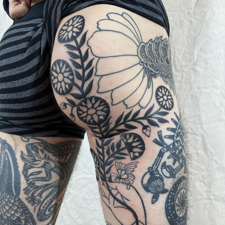 Intricate Dotwork Floral Tattoo on Thigh