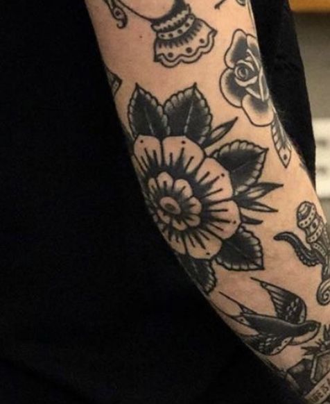 Timeless Traditional Flower Tattoo