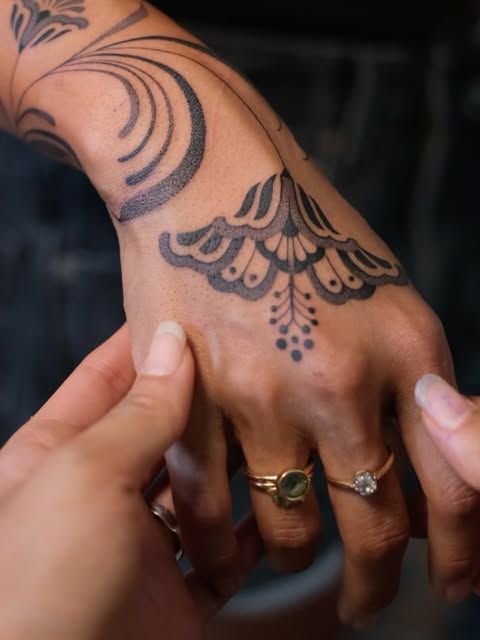 Elegant Blackwork Hand Tattoo Ideas