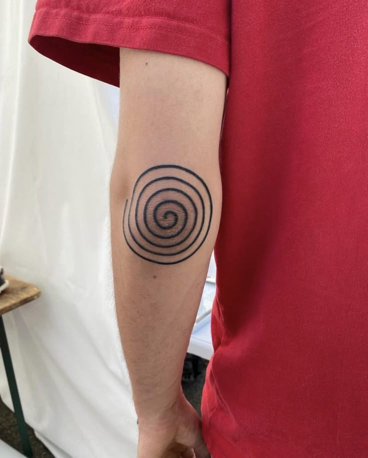 Elegant Spiral Elbow Tattoo Design