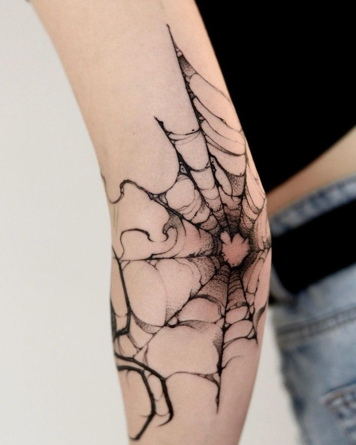 Intricate Spiderweb Elbow Tattoo