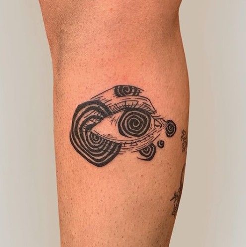 Intricate Spiral Elbow Tattoo