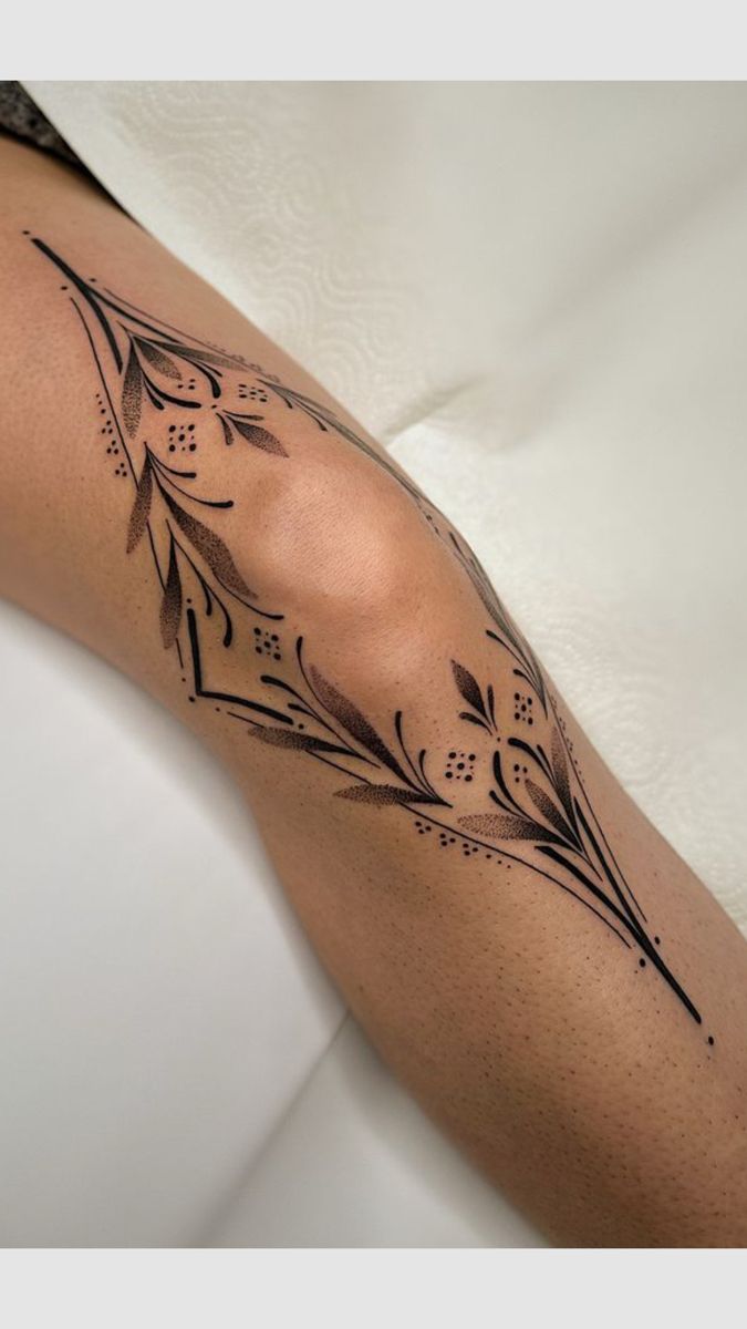 Elegant Blackwork Elbow Tattoo Design