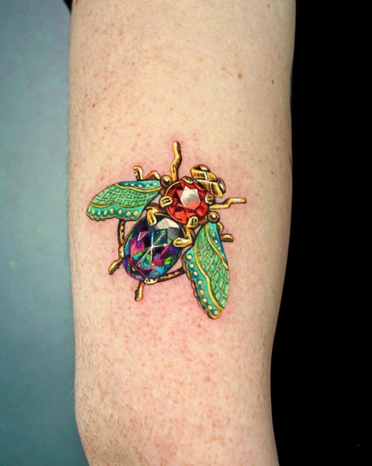 Vibrant Embroidery Bug Tattoo