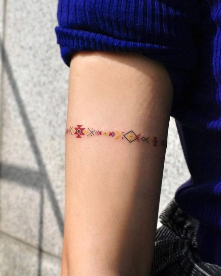 Vibrant Aztec Band Tattoo for a Bold Statement