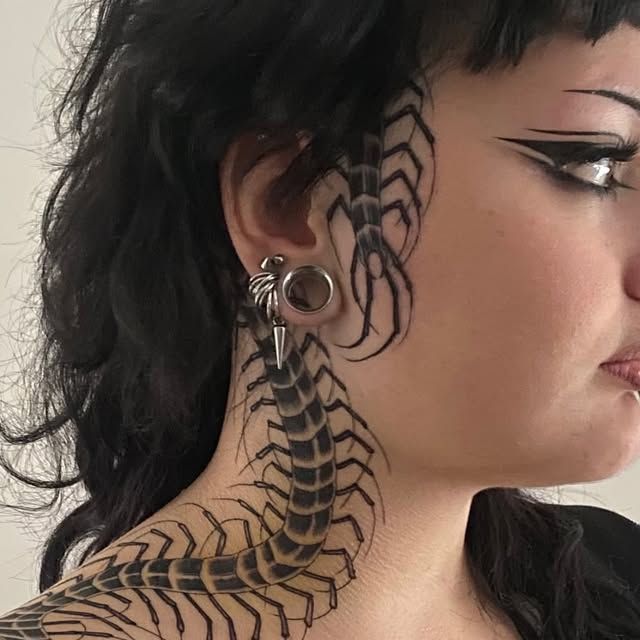 Bold Blackwork Scorpion Face Tattoo