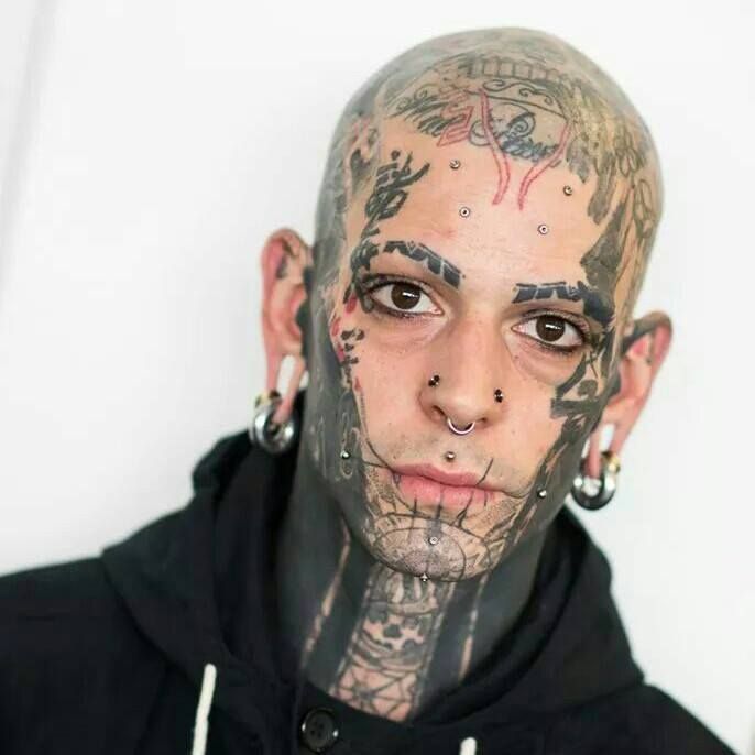 Intricate Gothic Face Tattoo