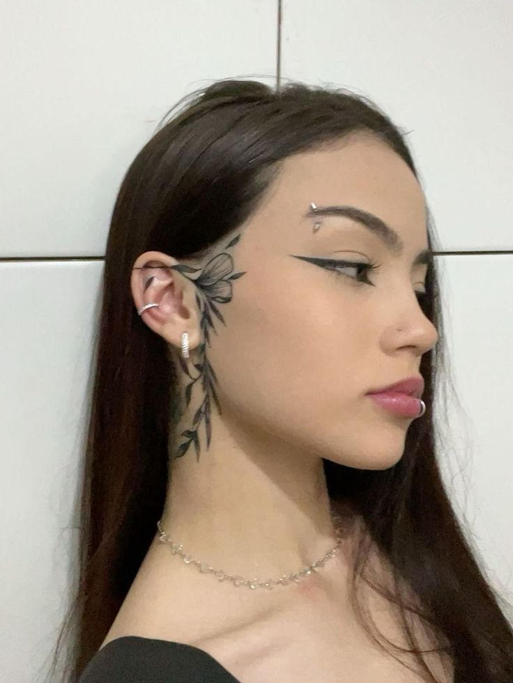 Elegant Floral Face Tattoo