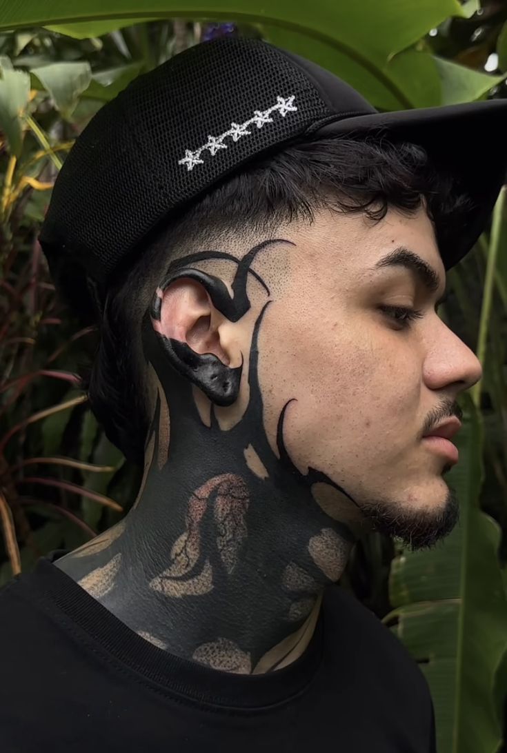 Bold Blackwork Face Tattoo Designs