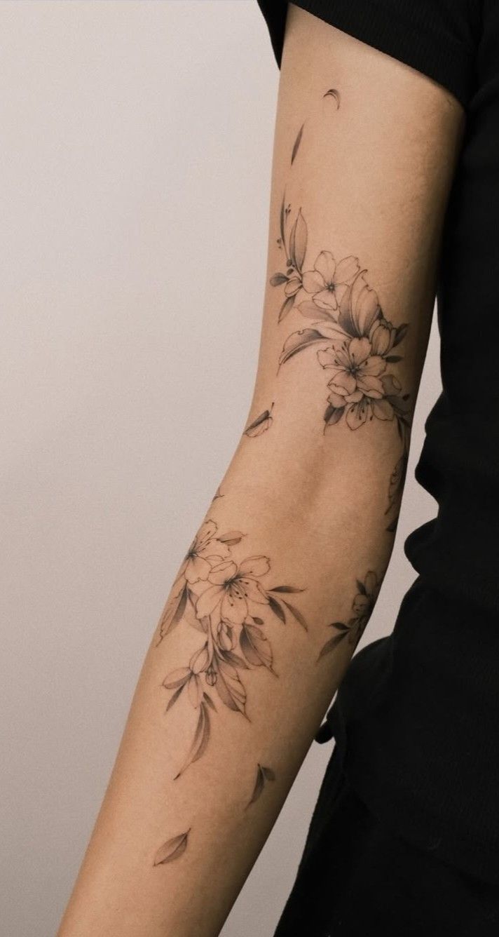 Delicate Floral Arm Tattoo