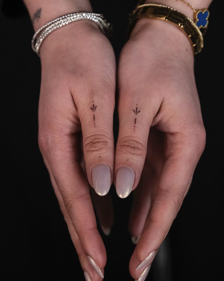 Elegant Minimalist Finger Tattoo Design