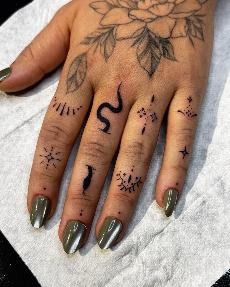 Minimalist Blackwork Finger Tattoo Inspiration