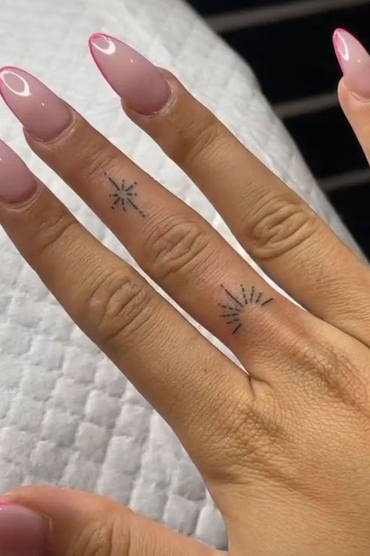 elegant minimalist finger tattoo design