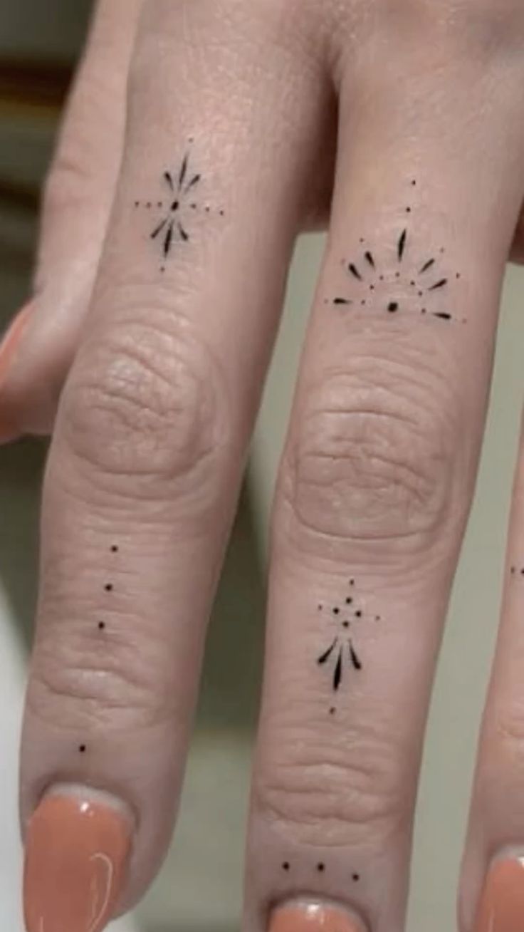 elegant minimalist finger tattoo design