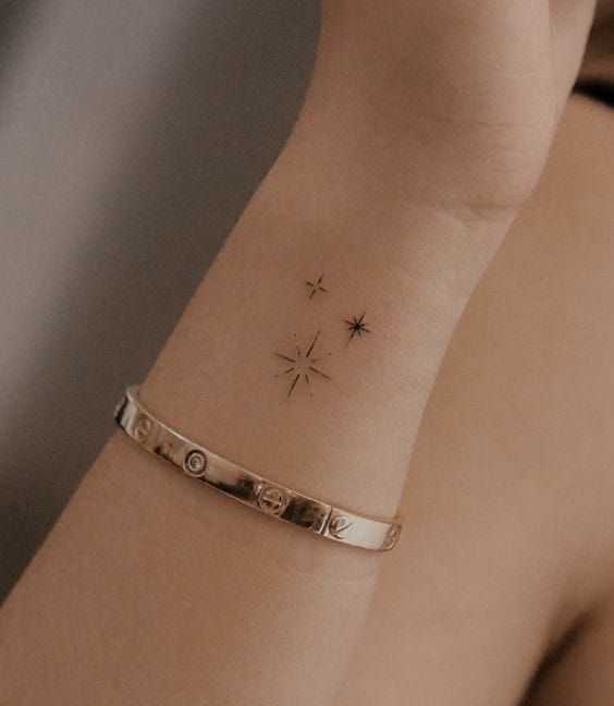 minimalist star finger tattoo design