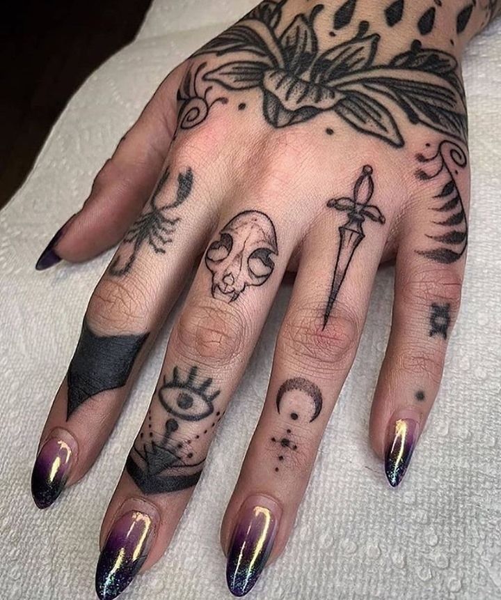 Intricate Blackwork Finger Tattoo Design