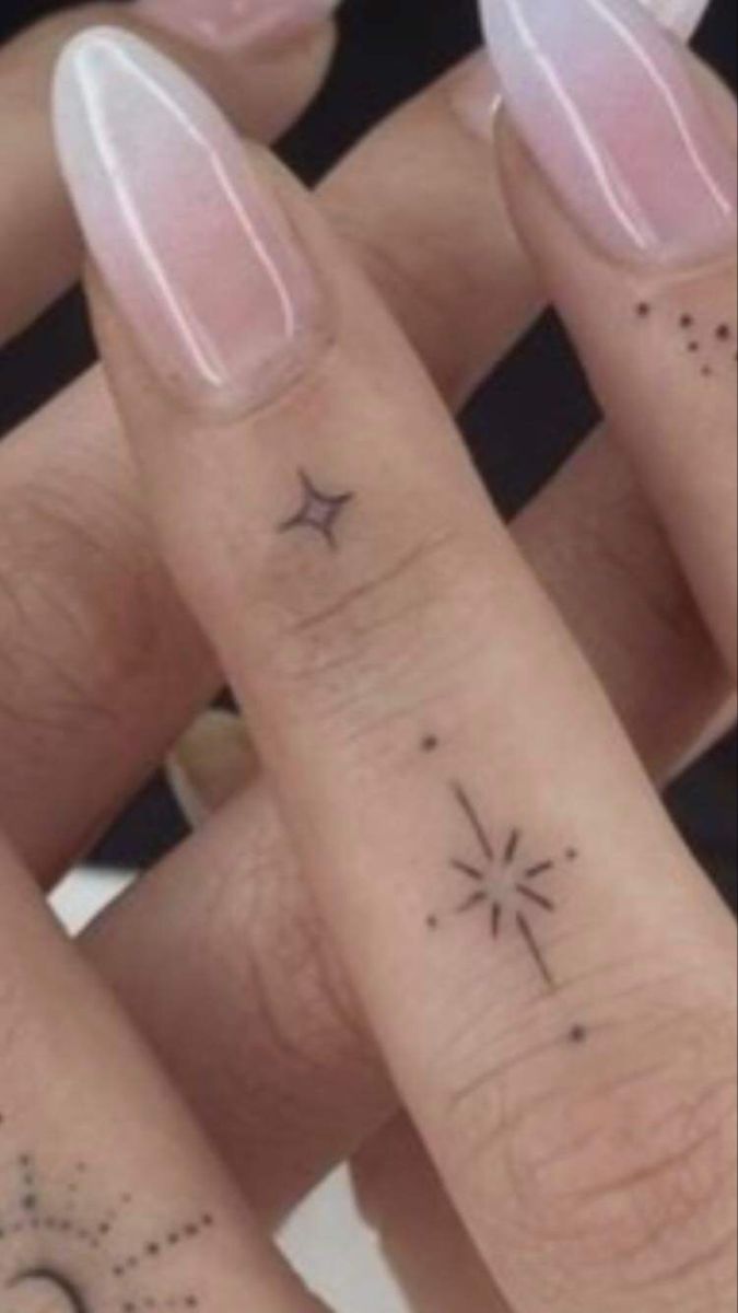 elegant minimalist finger tattoo design