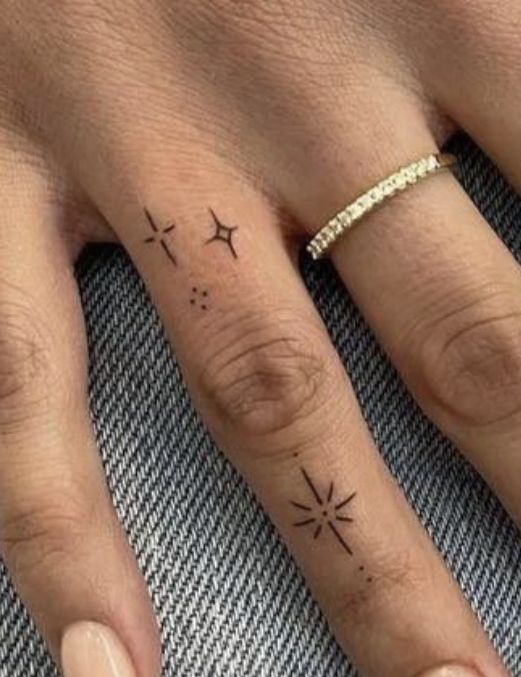 elegant minimalist finger tattoo design