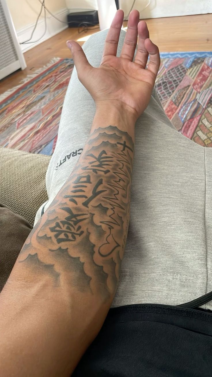 Bold Blackwork Forearm Tattoo Design