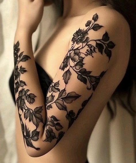 Elegant Floral Blackwork Forearm Tattoo