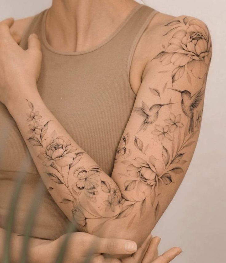 Elegant Floral Forearm Tattoo with Hummingbird