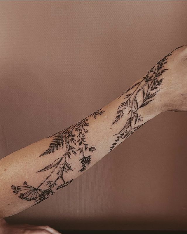 Elegant Floral Forearm Tattoo Design