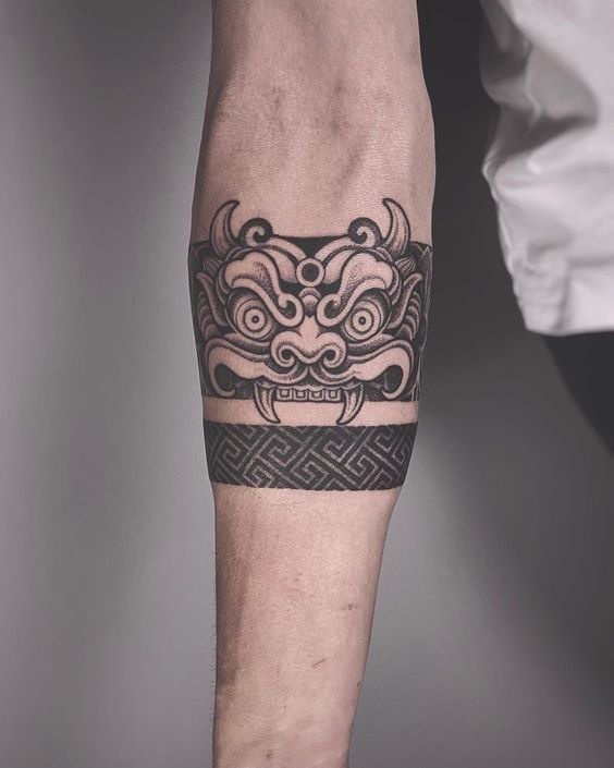 Intricate Geometric Forearm Tattoo Design