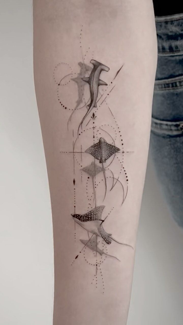 Intricate Geometric Forearm Tattoo