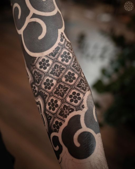 Intricate Geometric Sleeve Tattoo