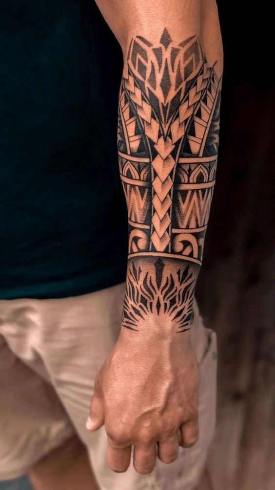 Bold Tribal Half Sleeve Tattoo for the Forearm