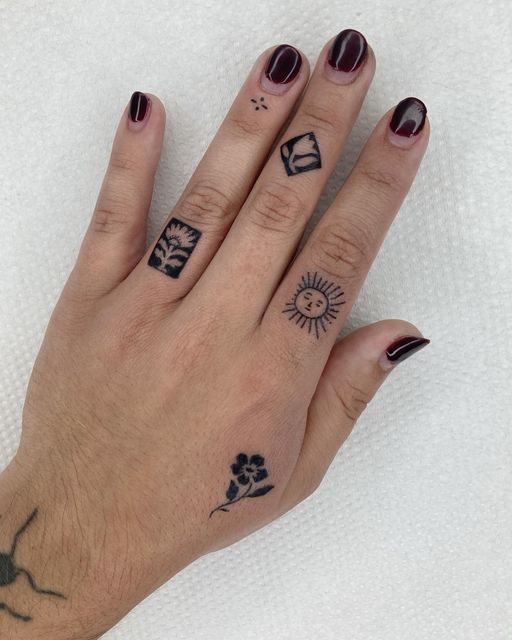 Chic Blackwork Hand Tattoo Designs