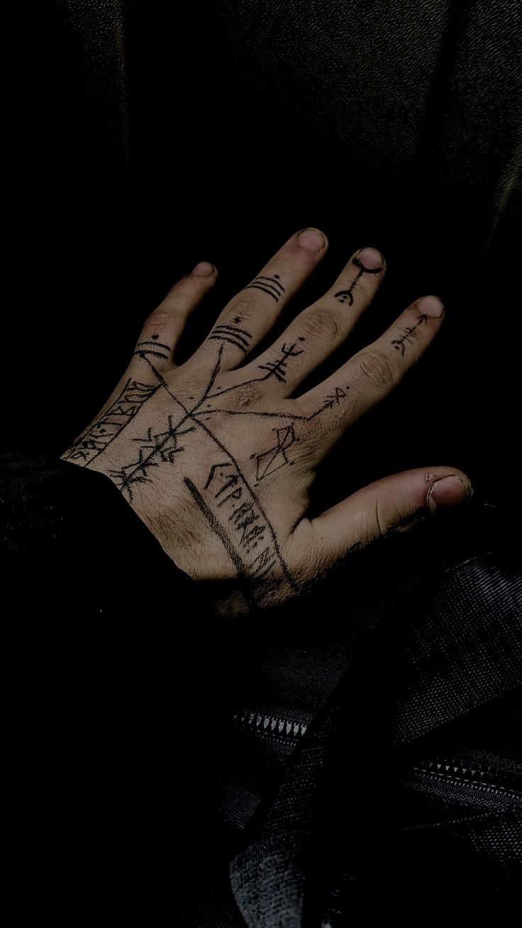 Intricate Blackwork Hand Tattoo Design