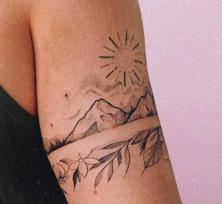 Nature's Embrace: Minimalist Mountain Tattoo