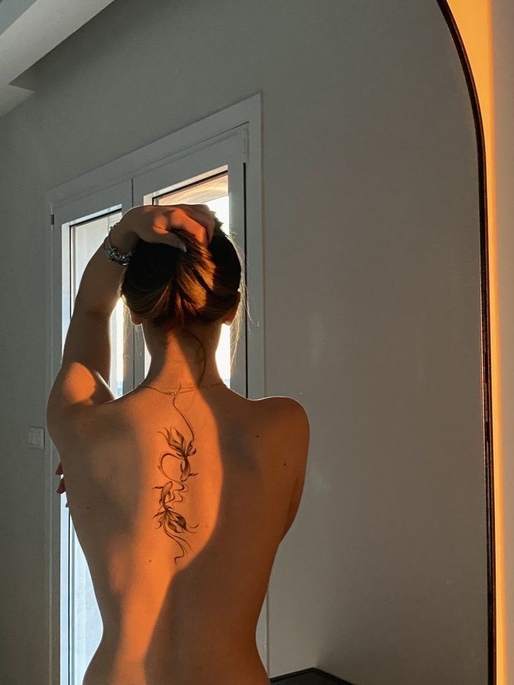 Elegant Minimalist Back Tattoo Design