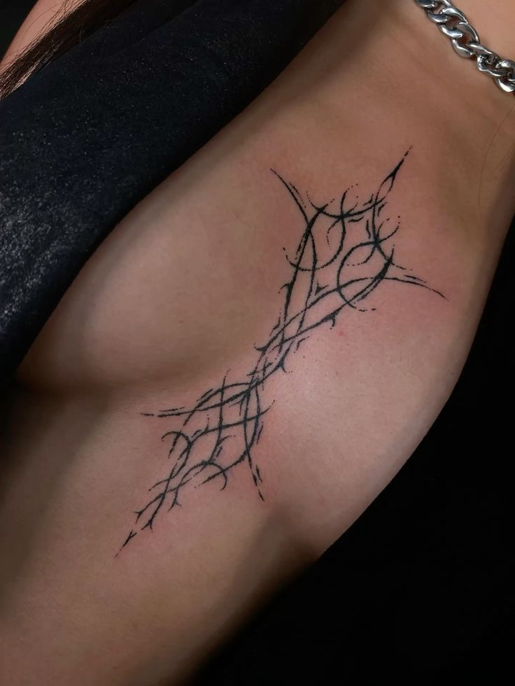 Intricate Blackwork Hip Tattoo Design