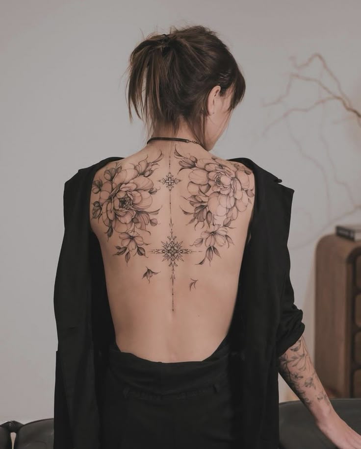 Elegant Floral Back Tattoo Design