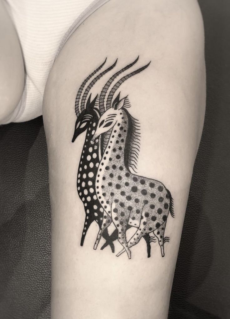 Intricate Animal Illustrative Tattoo