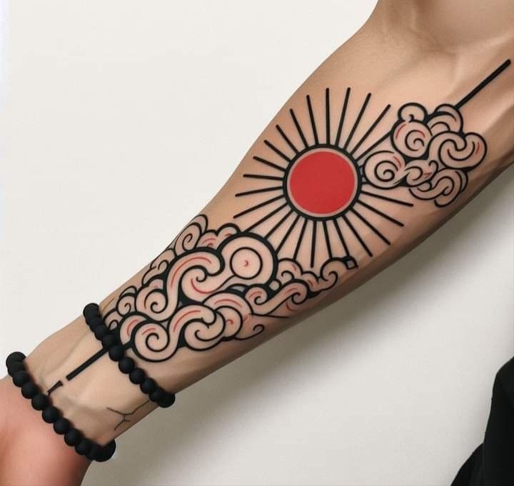 Vibrant Japanese Sun and Cloud Forearm Tattoo