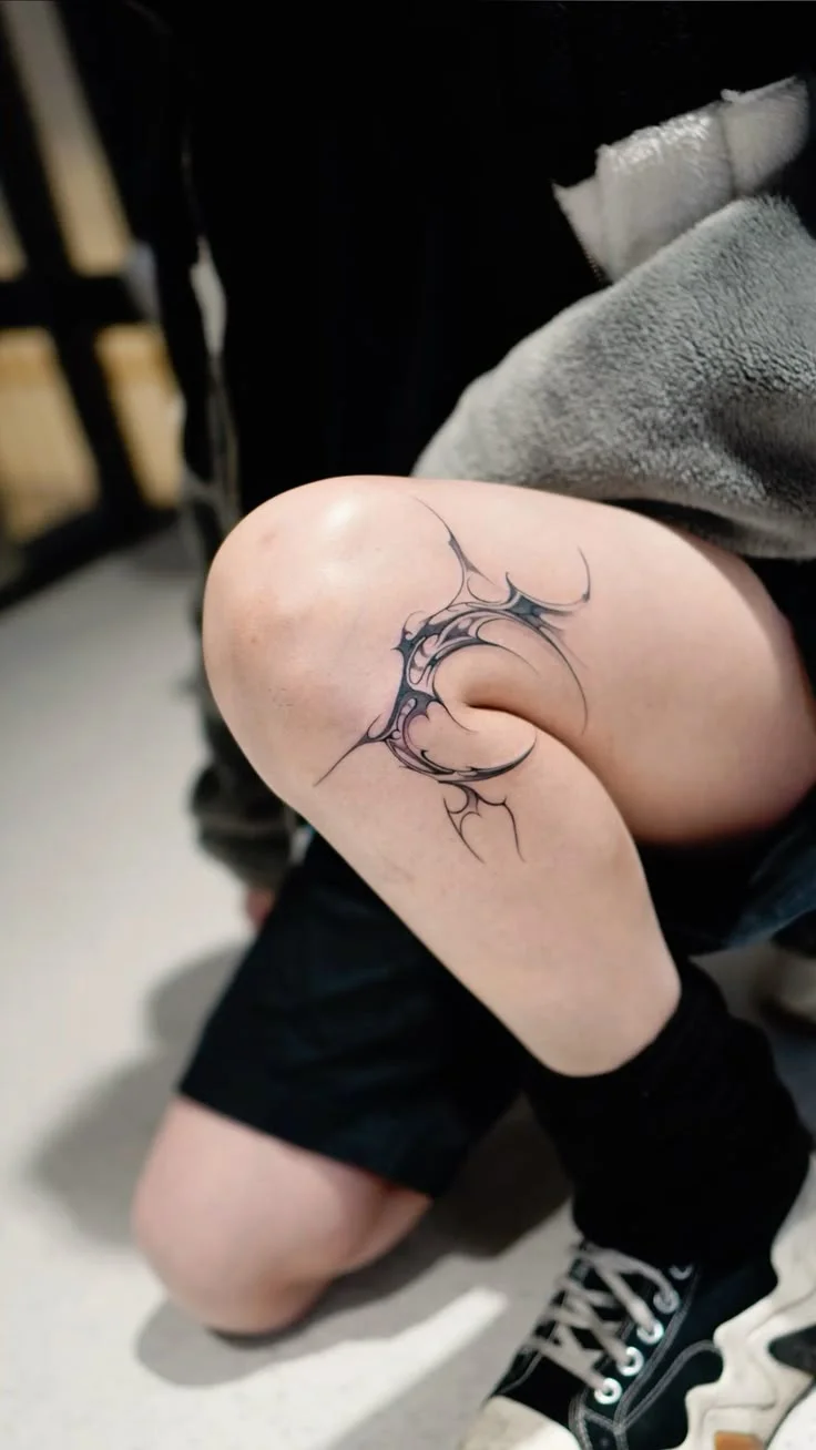 Intricate Blackwork Knee Tattoo for Women