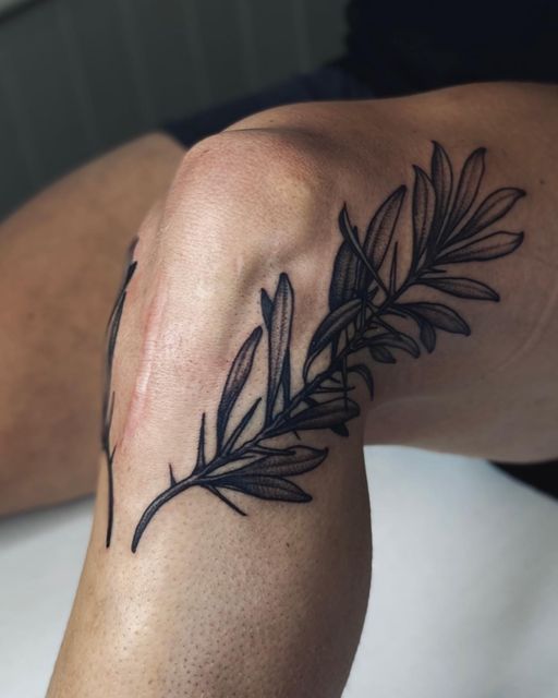 Elegant Floral Knee Tattoo Design