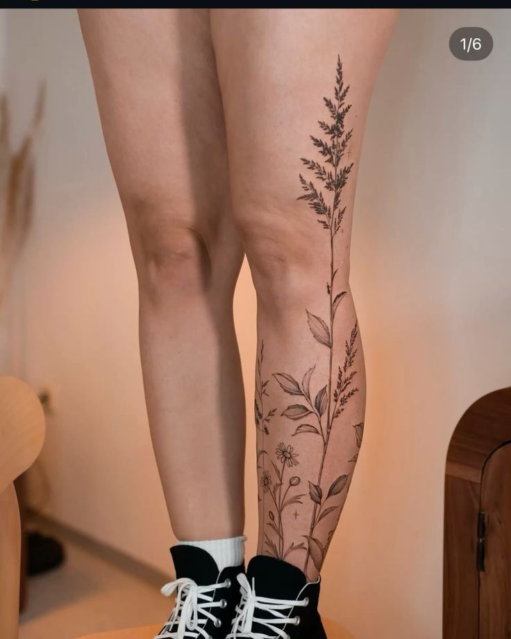 elegant floral knee tattoo design