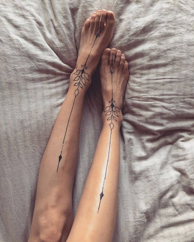 Elegant Blackwork Leg Tattoo Design