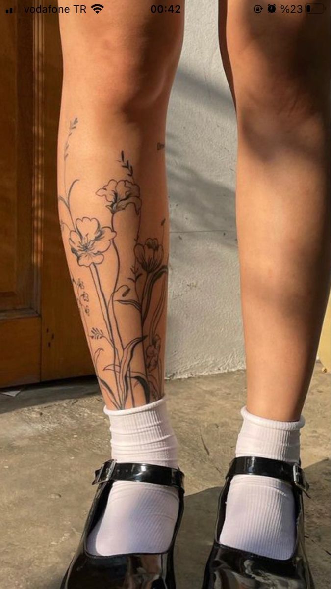 Elegant Floral Leg Tattoo Design