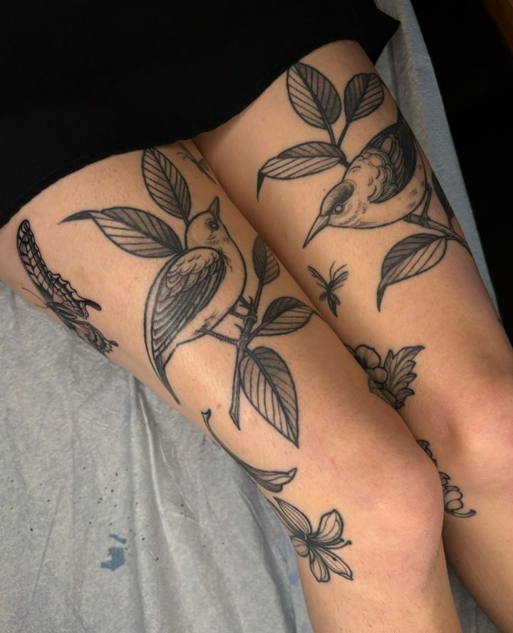 Nature's Embrace: Thigh Blackwork Tattoo
