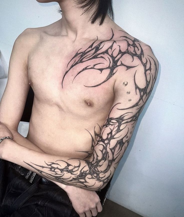 Bold Tribal Arm Tattoo Design